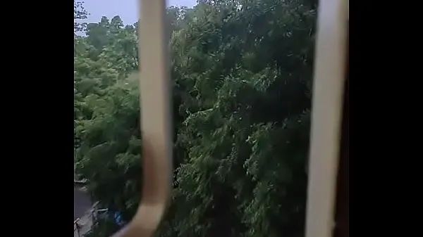 Store Husband fucking wife in doggy style by enjoying the rain from window fine filmer