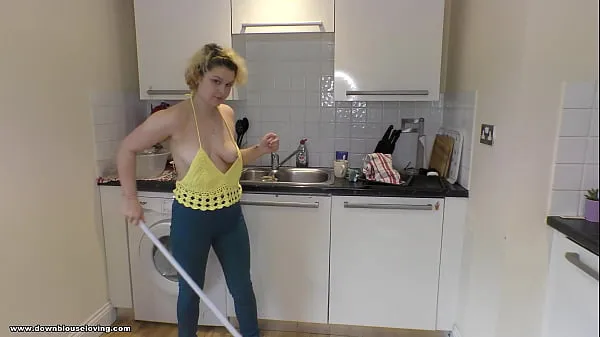 Store Delilah mops the kitchen floor and gives great downblouse view fine filmer